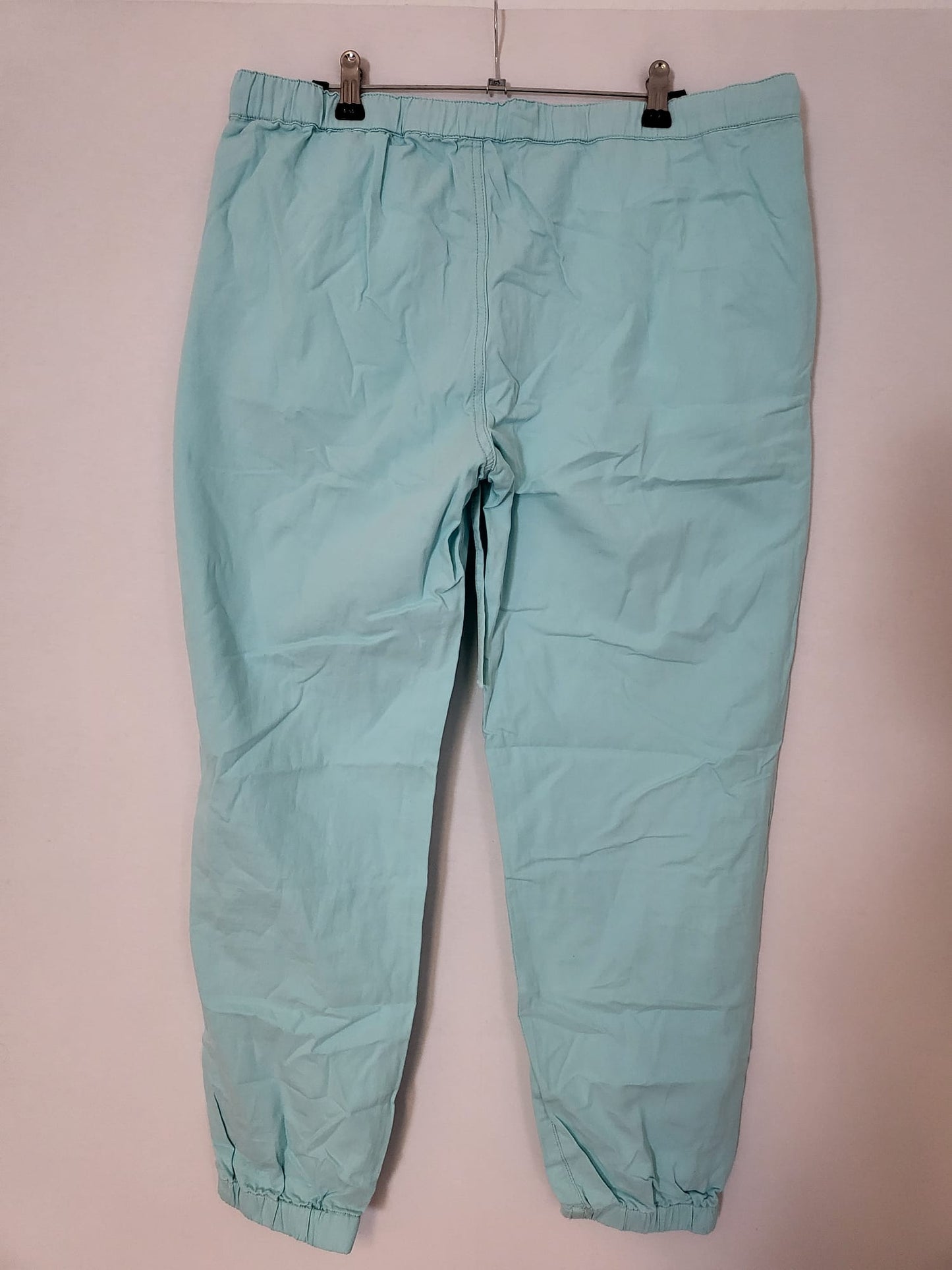 Kurzgeschnittener Jogger Türkis Gr L   Tasche, Kordelzug mit gummibund am Bein  050