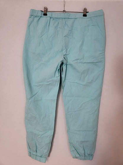 Kurzgeschnittener Jogger Türkis Gr L   Tasche, Kordelzug mit gummibund am Bein  050
