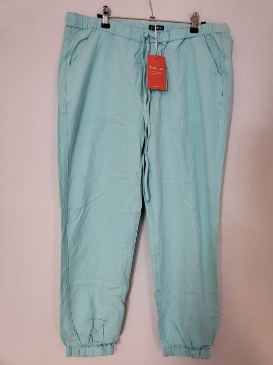Kurzgeschnittener Jogger Türkis Gr L   Tasche, Kordelzug mit gummibund am Bein  050